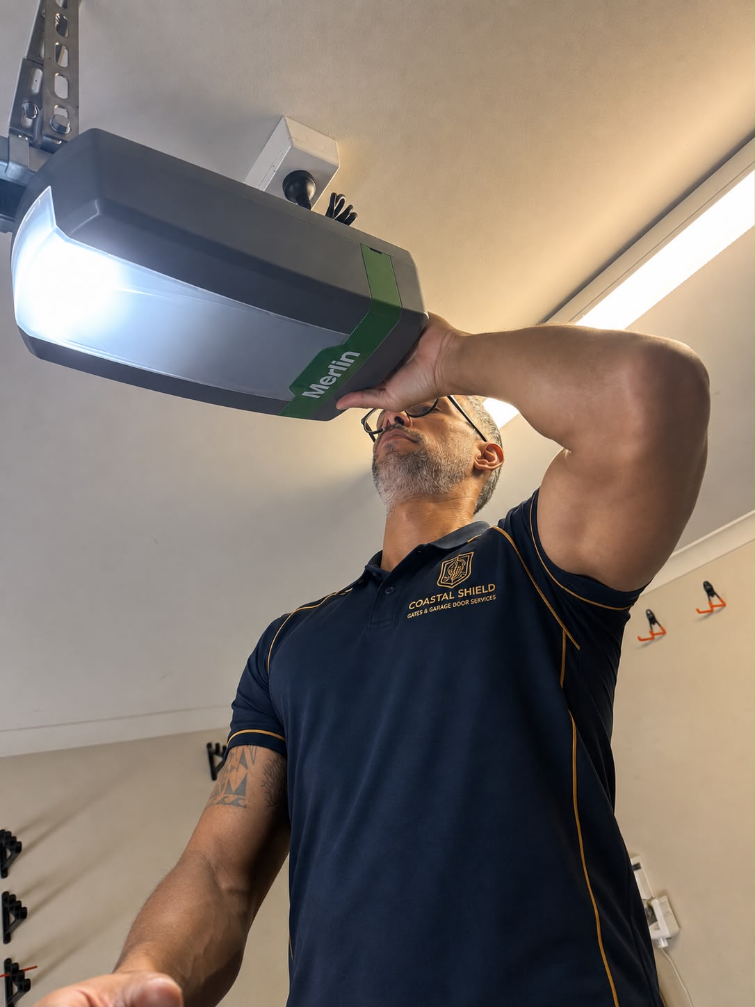 Technician checking opener settings