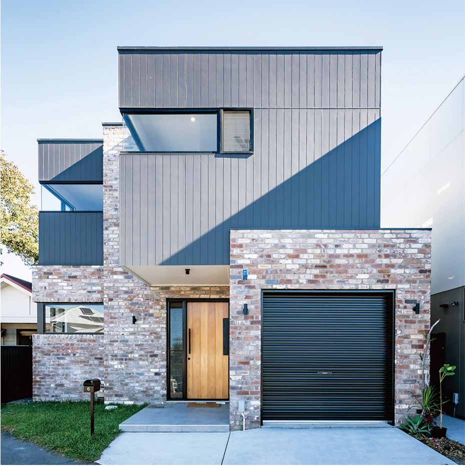 Roller garage door on a residential facade