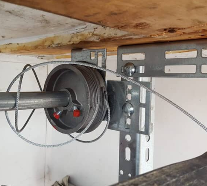 Garage door cable drum repair
